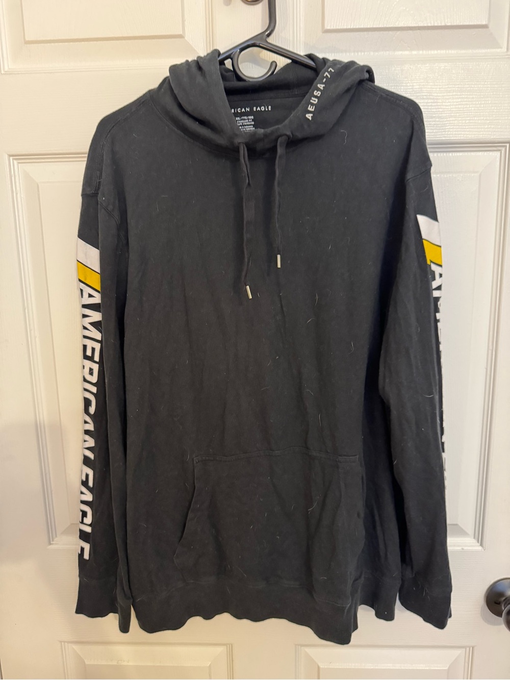 American Eagle Black Hoodie with White and Yellow Sleeve Graphics